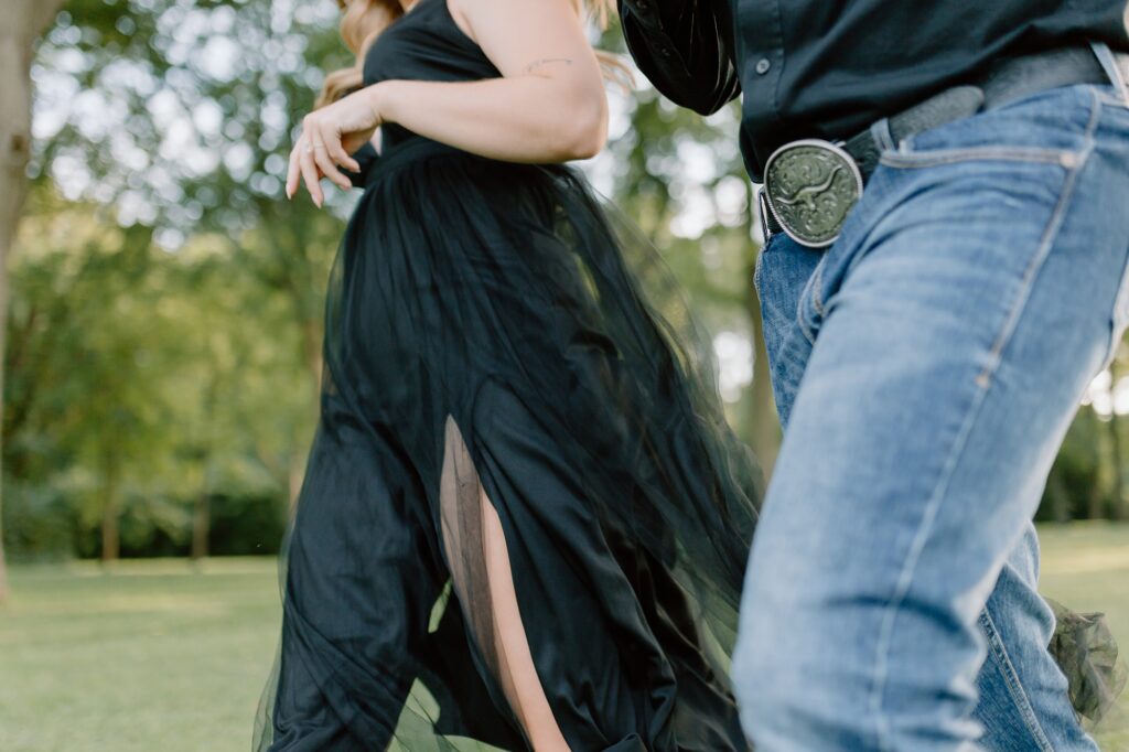 A couple poses for their country themed engagement photos at Danada Equestrian center in Wheaton Illinois.