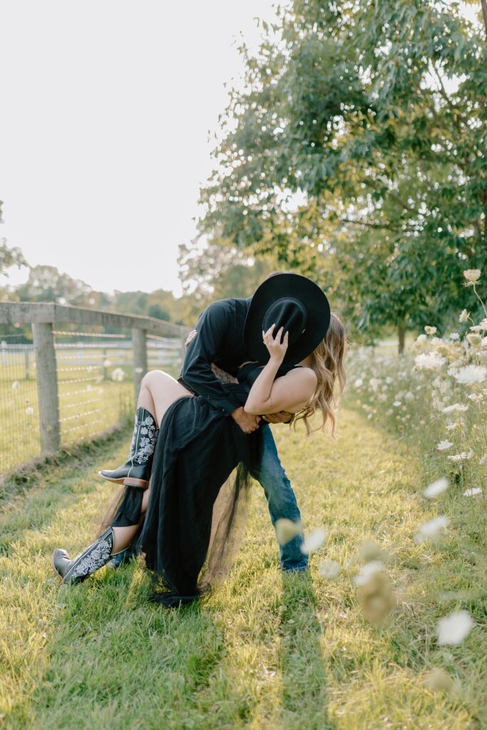 A couple poses for their country themed engagement photos at Danada Equestrian center in Wheaton Illinois.